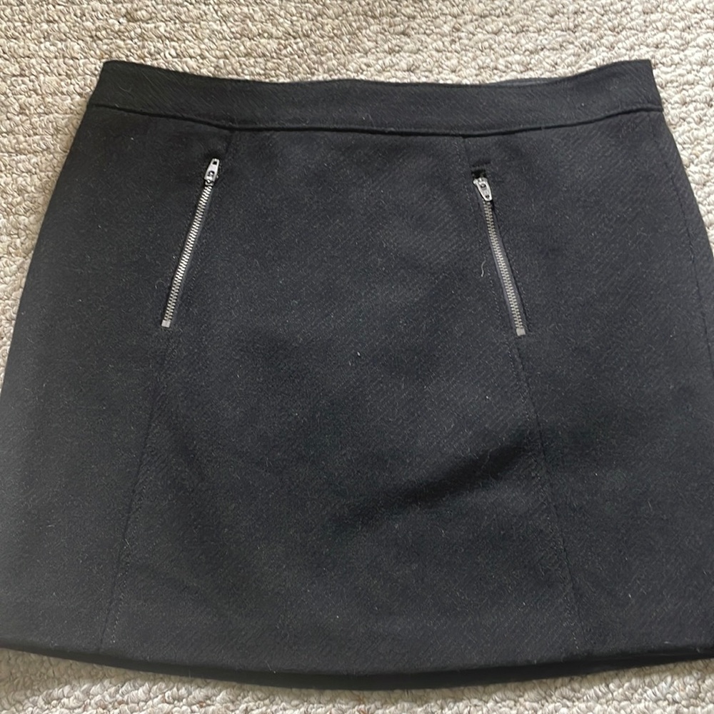 Super cute black wool mini skirt with zippered pockets from The Gap